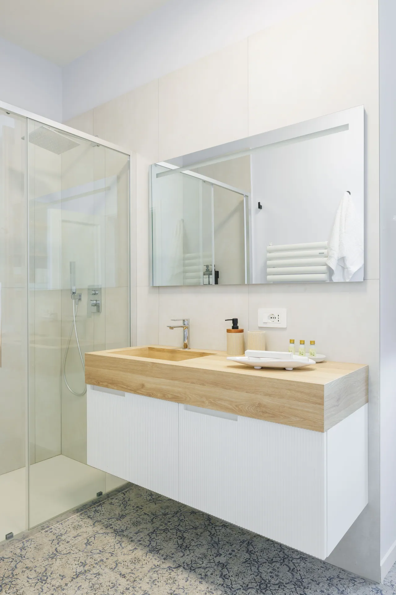the light bathroom, with its oak counter