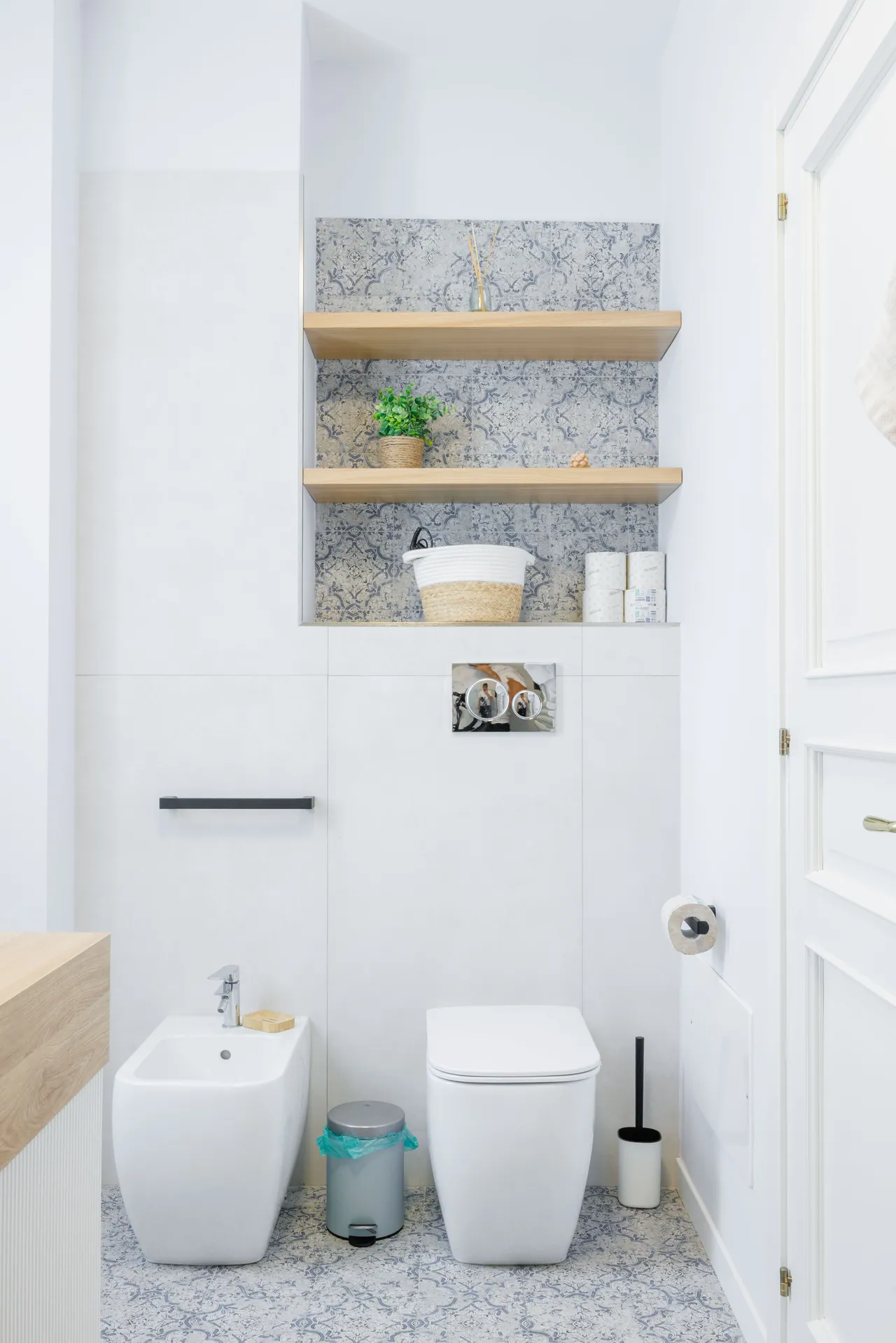 the light bathroom, with its oak counter