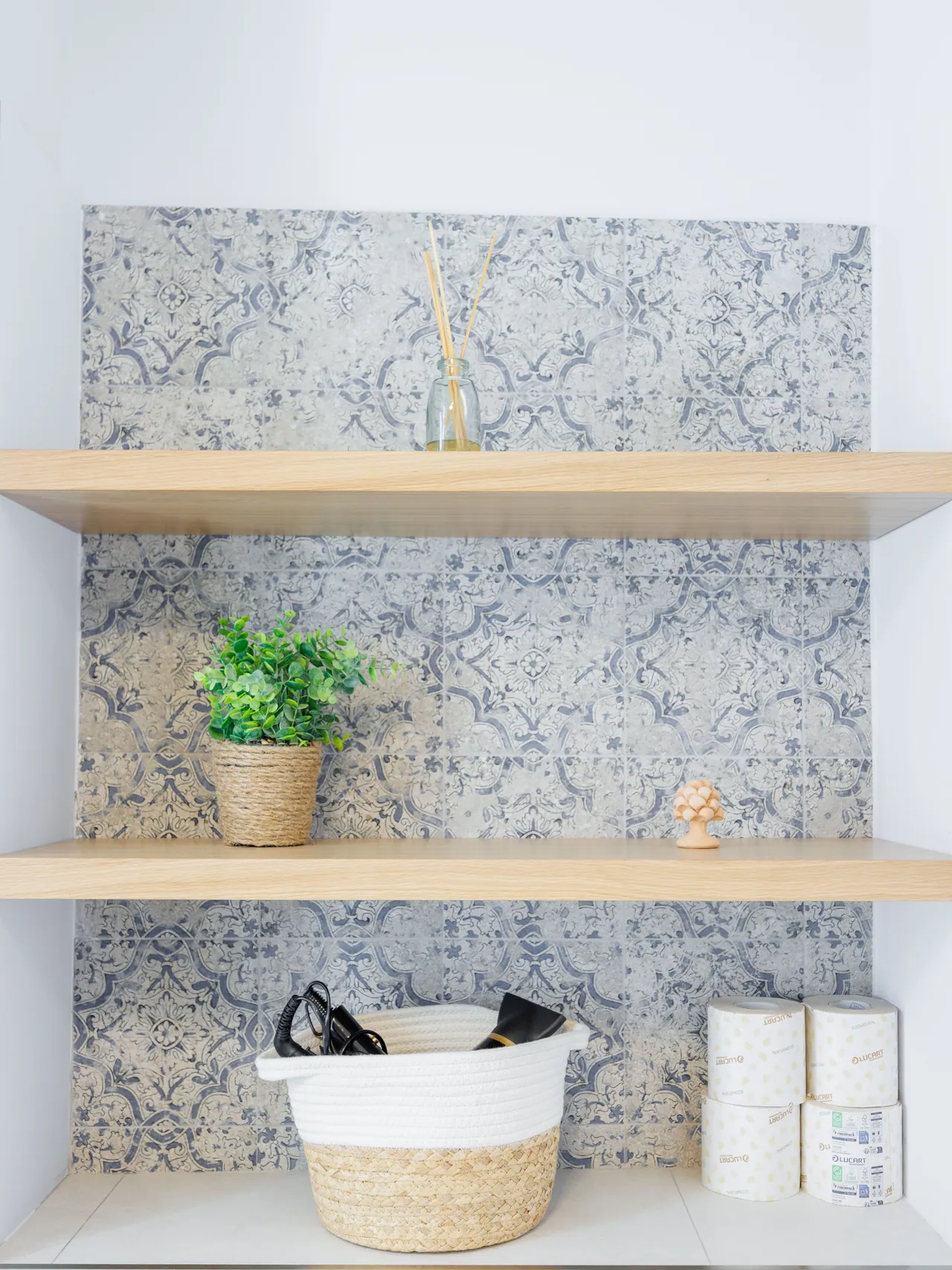 the light bathroom, with its oak counter