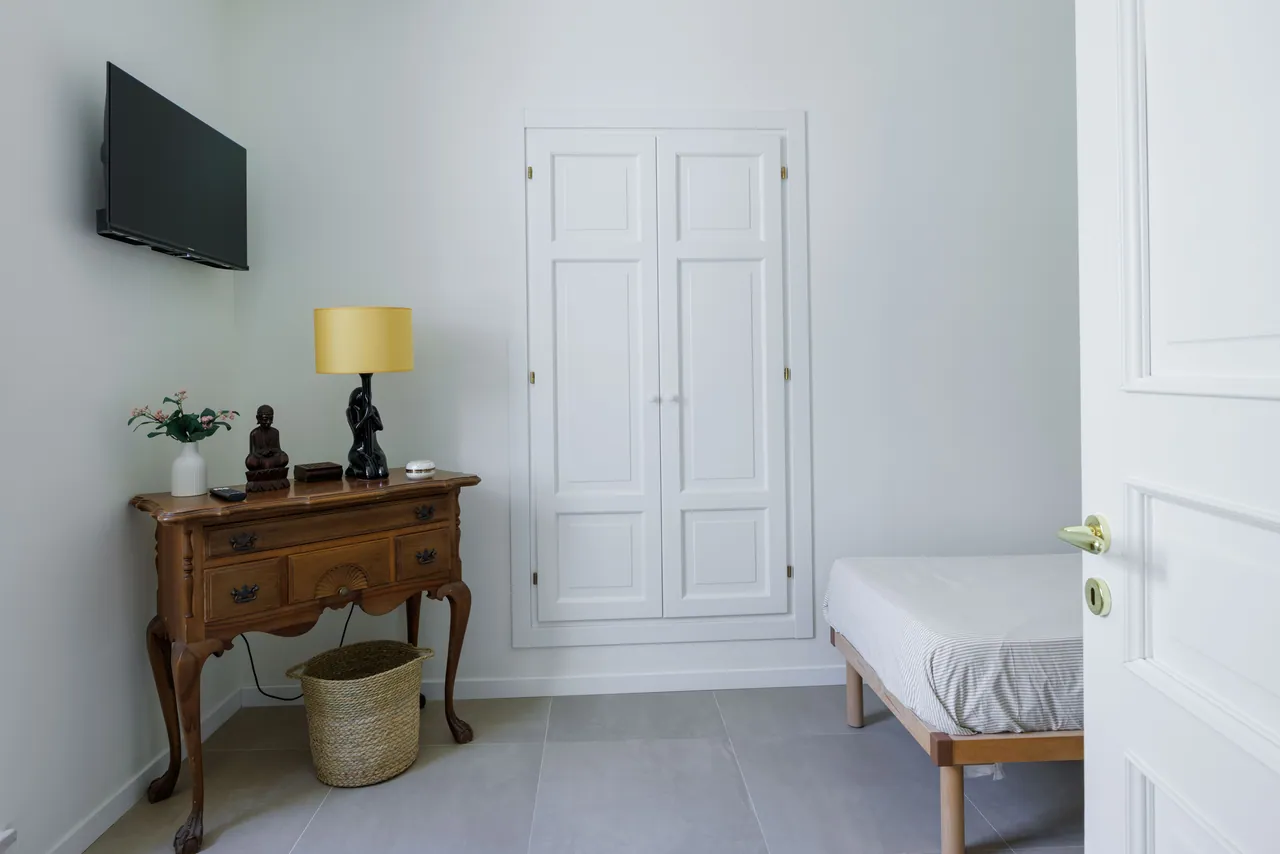 the bedroom with two separate beds