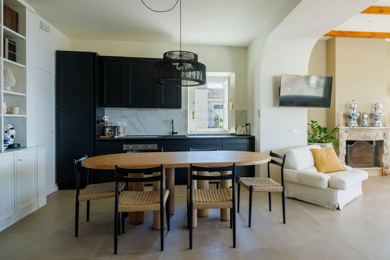 the dining table at Casa Awaya, open to the living room