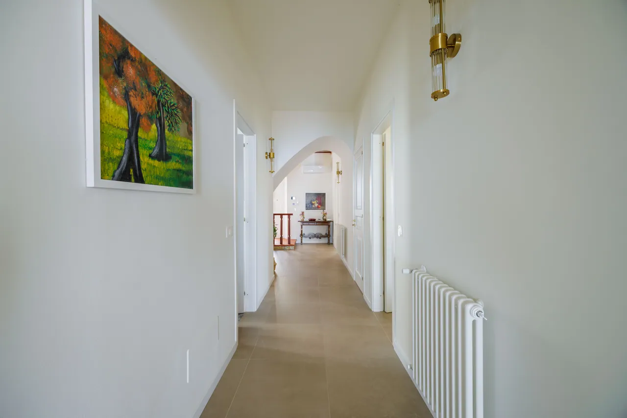 the hand-painted majolica staircase and the hallways